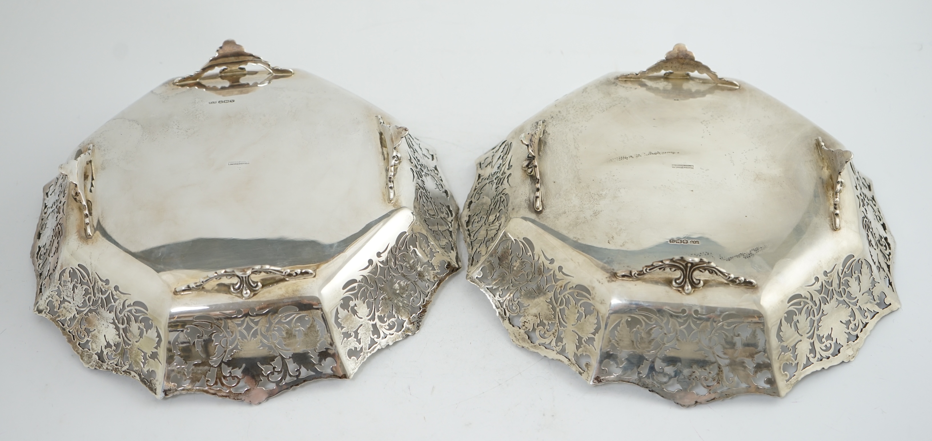 A pair of George VI pierced silver shallow circular fruit bowls, by Mappin & Webb